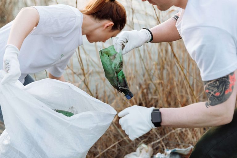 couple picking up trash